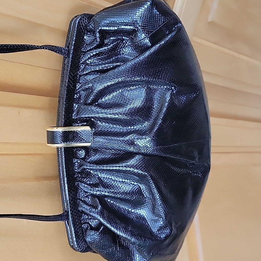 Black Shoulder Bag with Pleated Design and Silver Clasp